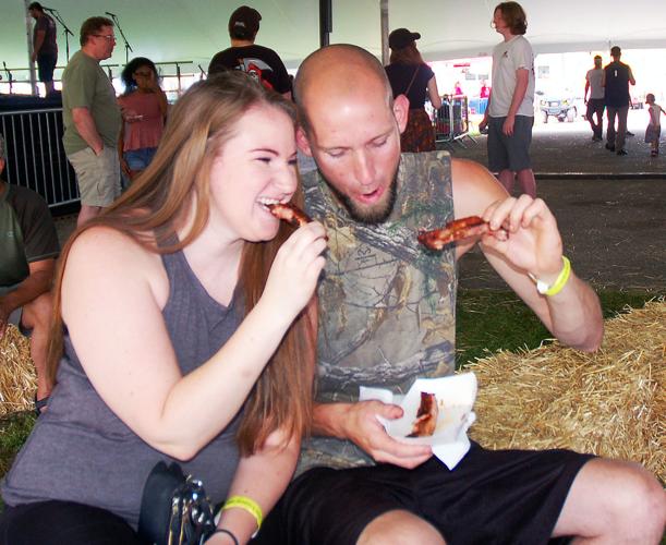 Patrons sample ribs at Ribfest