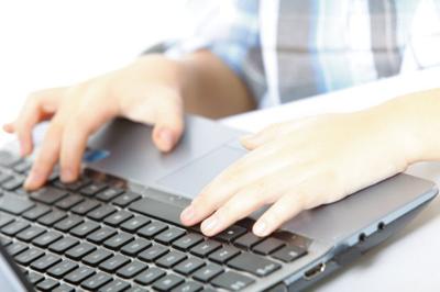 generic stock photo student laptop virtual school