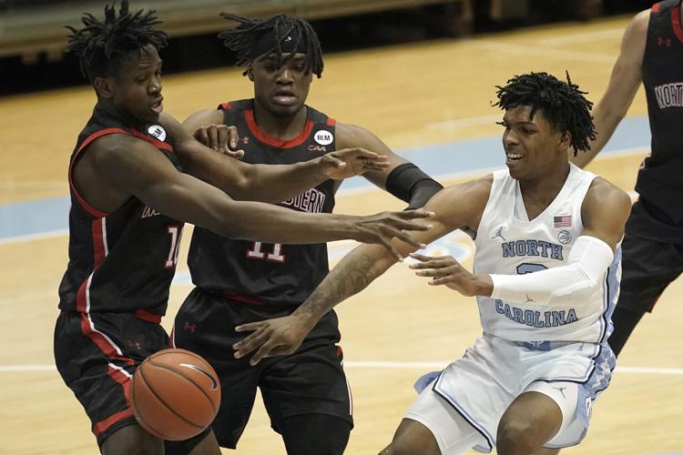 UW basketball jump photo 3-14