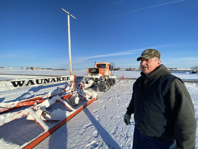 Grooming the snowmobile trail