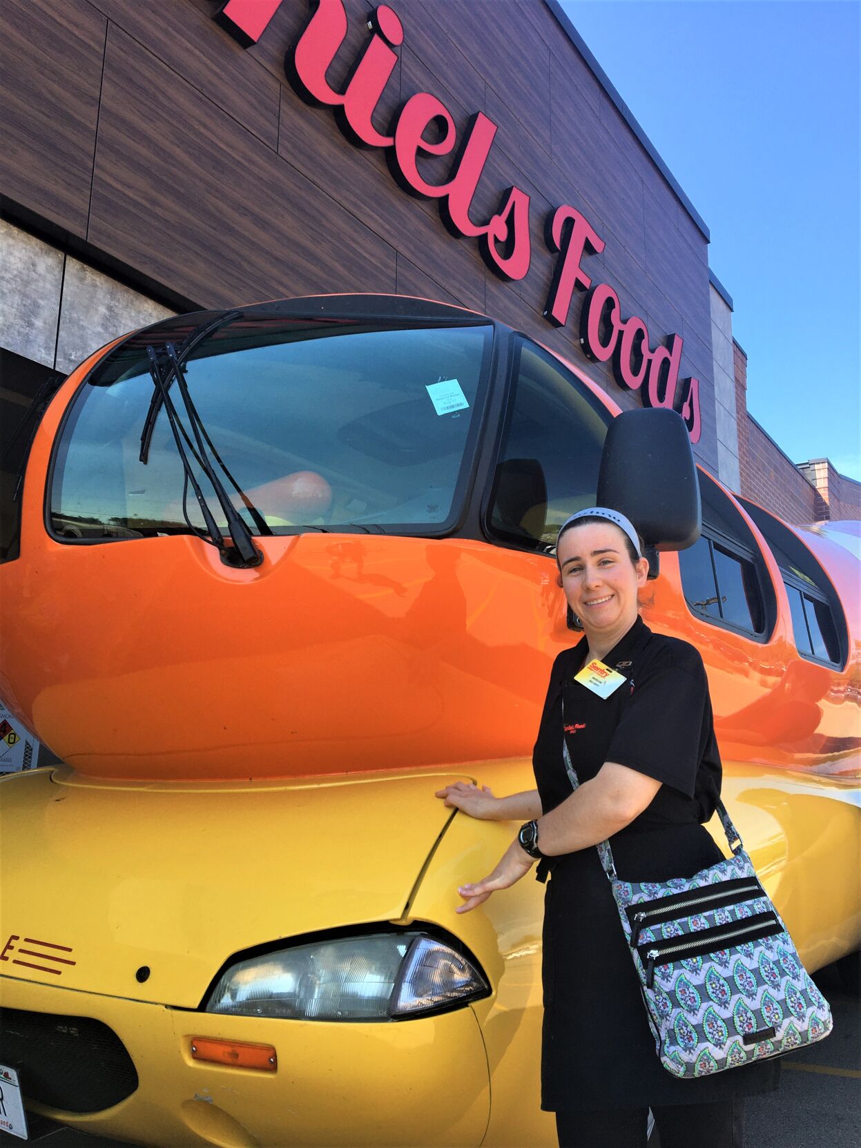Daniels Foods employee Madeline Wanecke visits the Oscar Mayer Wienermobile