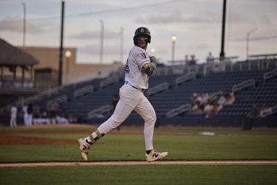 Andrew Fischer celebrates a home run for the Biloxi Shuckers during his remarkable 2026 season.