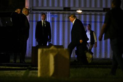 U.S. President Trump returns following a visit to Ireland