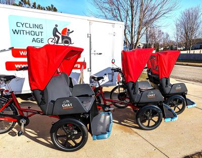 Electric assist trishaw bikes operated by the Walworth County chapter of Cycling Without Age