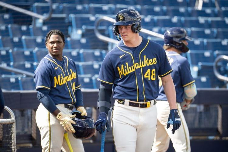 Milwaukee Brewers first base prospect Eric Bitonti prepares two bat during spring training workouts Tuesday, February 17, 2026, at American Family Fields of Phoenix in Phoenix, Arizona.