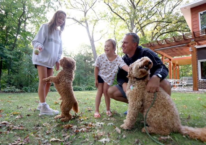 Dad, two daughters, two dogs