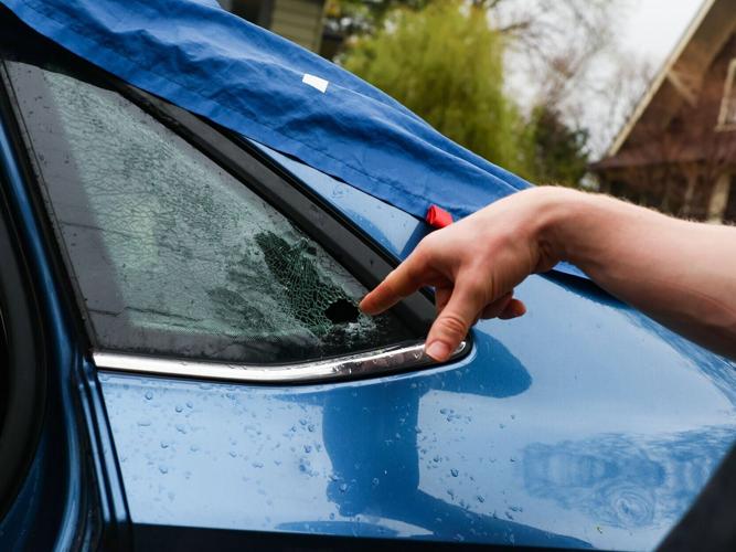 Hole in window from hail