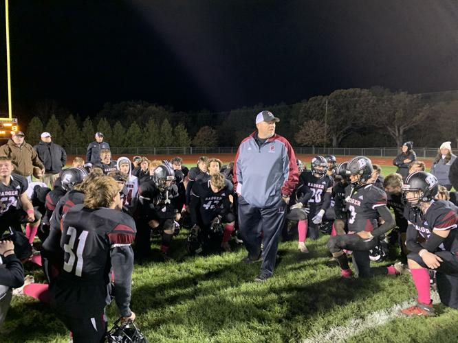 Badger Head Coach Matt Hensler talks to his team after their second-round loss