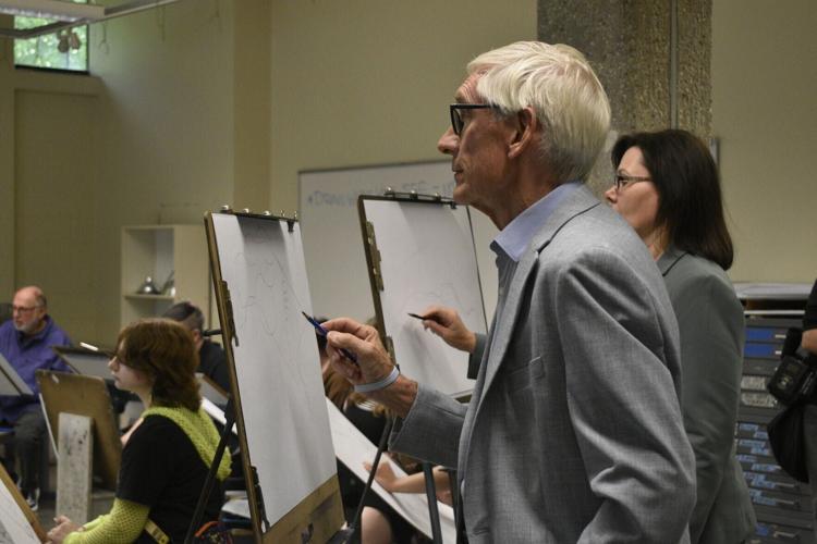 Gov. Tony Evers and UW-Parkside chancellor draw