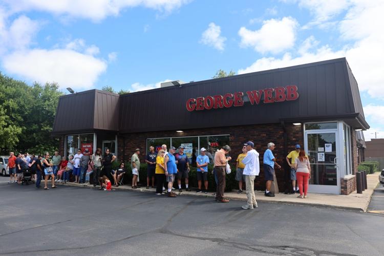 Brewers fans line up for free burgers at George Webb in Caledonia