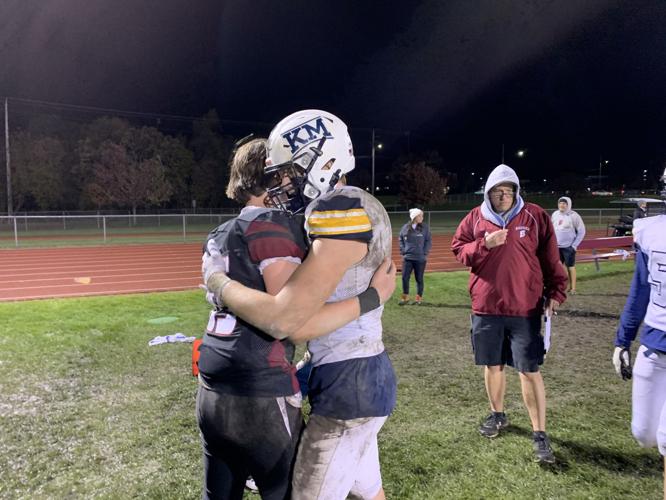 The Badgers and Kettle Moraine Lasers congratulate each other