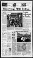Page A1 of next day's State Journal