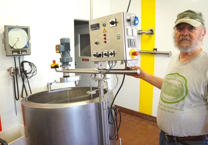 Cheesemaker S. Terry Woods, co-owner of Highfield Farm Creamery in the Town of Linn