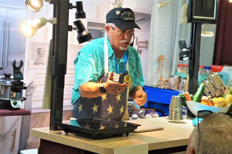 Cookware vendor Mark Temares gives a demonstration in the Wisconsin State Fair's Exhibition Hall