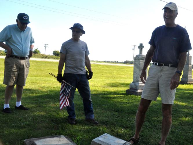 Dave Altwies, from left, Tim Walters and Jerry Hawver discuss some upcoming work