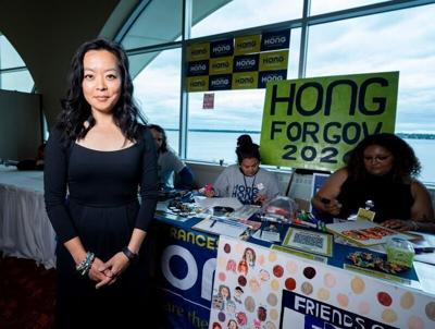 Democratic gubernatorial candidate and state Rep. Francesca Hong stands for a portrait next to her campaign booth during the 2026 Wisconsin Democratic Convention at the Monona Terrace Community and Convention Center in Madison, Wisconsin on June 14, 2026.