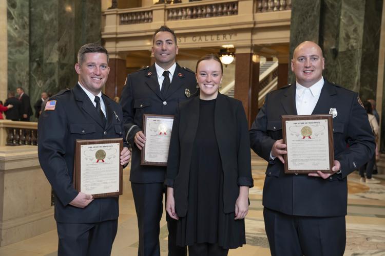 Members of the Racine Fire Department and Representative Greta Neubauer