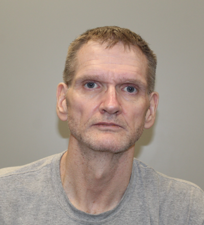 Man arrested after driving vehicle with deceased female in rear seat