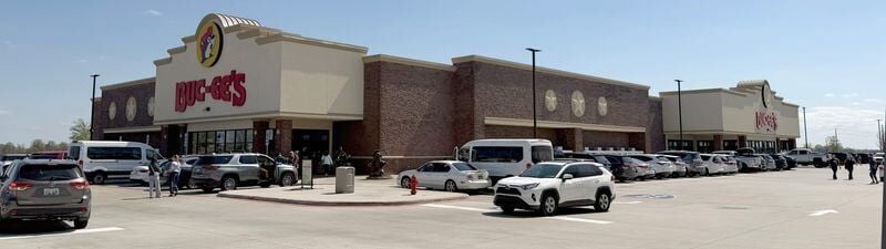 Customers patronize a Buc-ee’s gas station/store March 29 in Athens, Alabama. The Texas-based company, known for operating huge convenience stores/gas stations will open a store in Oak Creek that will feature a 73,370-square-foot convenience store, 120 ...