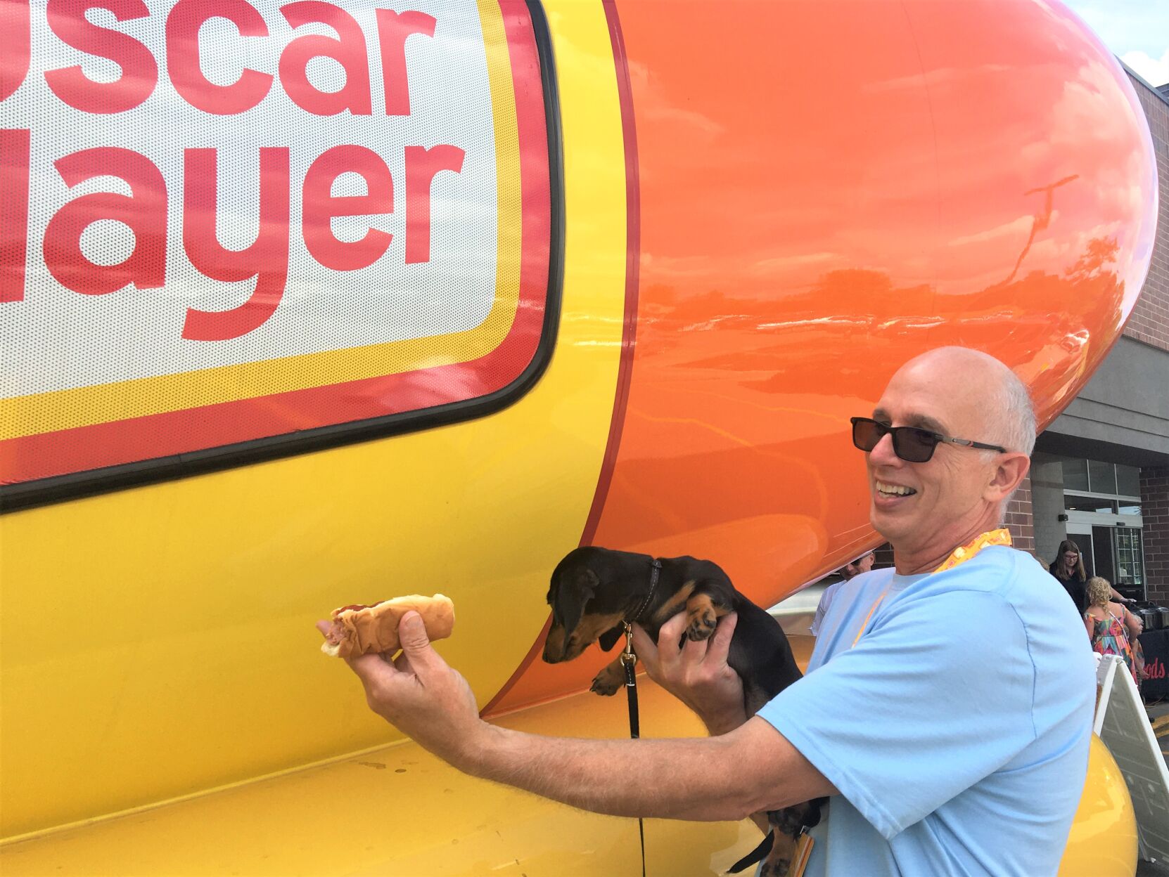 A dog-eat-dog world: "Molly" visits the Oscar Mayer Wienermobile