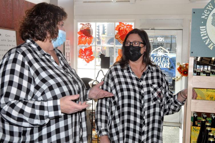 Roberta Robers, co-owner of The Farmstand, and Wendi Koenen, store manager, discuss some items to be featured at the store in the future