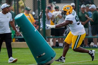Green Bay Packers defensive lineman Javon Hargrave (98) runs through a drill during a joint practice with the Arizona Cardinals on Wednesday, Aug. 26, 2026, at Ray Nitschke Field in Ashwaubenon, Wisconsin.