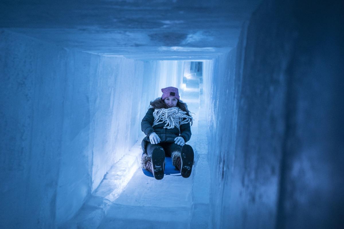Visitors to the ice castle structures in Lincoln, New Hampshire have enjoyed sliding down