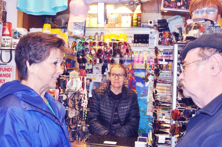 Harbormaster Linda Frame, left, meets with Riviera shop owners Iwona Gogo and Sol Kaniuk