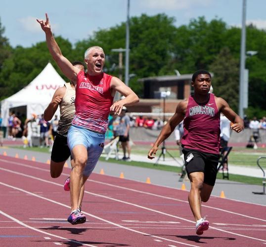 Arrowhead High School junior Trey Resch, left, celebrates his victory in the Division 1 boys 100m dash final during the WIAA State Track and Field meet in La Crosse, Wisconsin on Saturday, June 6, 2026.