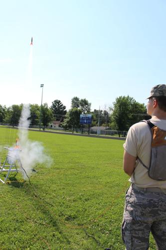 Ethan Welch launches and retrieve model rockets