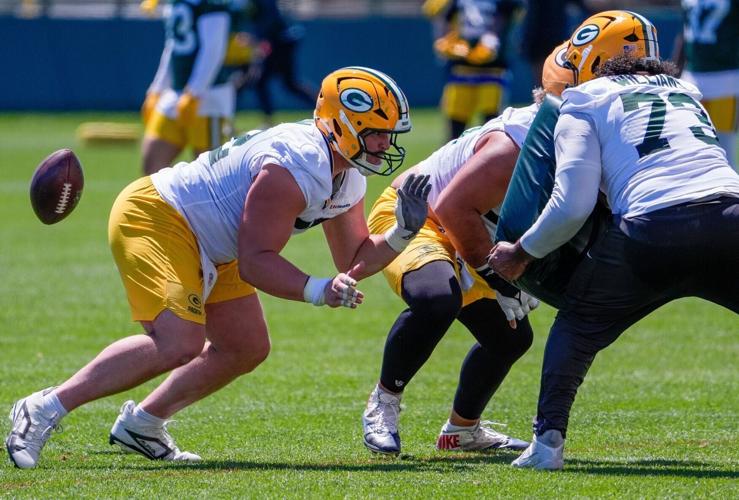 Green Bay Packers offensive lineman Jager Burton (52) runs through a drill during practice on Tuesday, June 2, 2026, at Ray