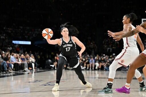 Las Vegas Aces' Megan Gustafson looks to pass