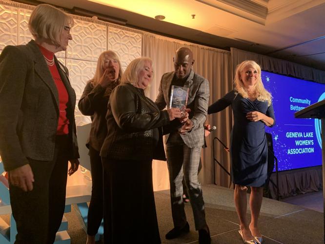 Members of the Geneva Lake Women's Association excitedly accept this year's Community Betterment Award