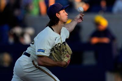 Robert Gasser pitches, AP generic file photo