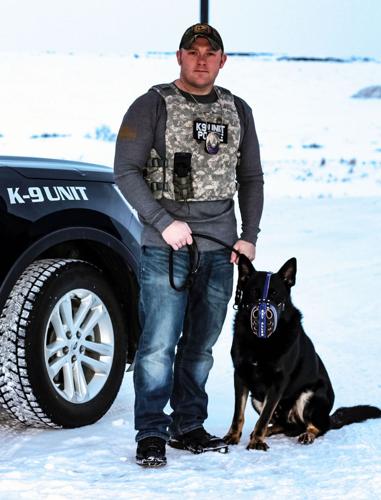 Officer Justin Timm and Rex