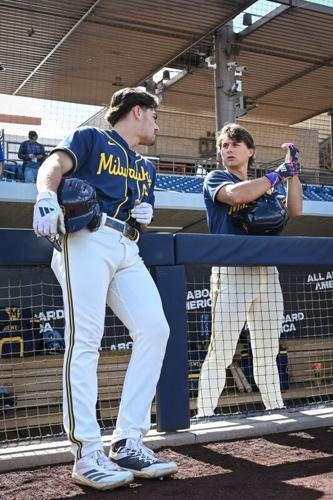 Milwaukee Brewers infield prospects Brady Ebel, left, and Josh Adamczewski talk during spring training workouts Tuesday, February 17, 2026, at American Family Fields of Phoenix in Phoenix, Arizona.