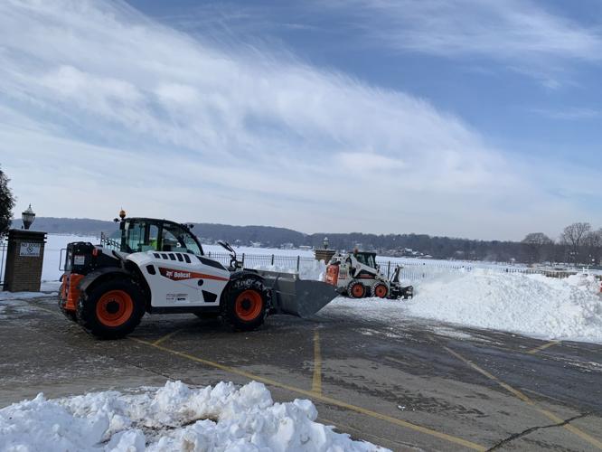 Crews begin to transport snow for the U.S. National Snow Sculpting Championship