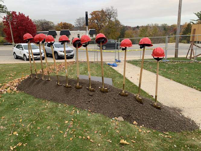 Hardhats and shovels are lined up to prepare for the groundbreaking ceremony for St. Francis de Sales Parish School's expansion project
