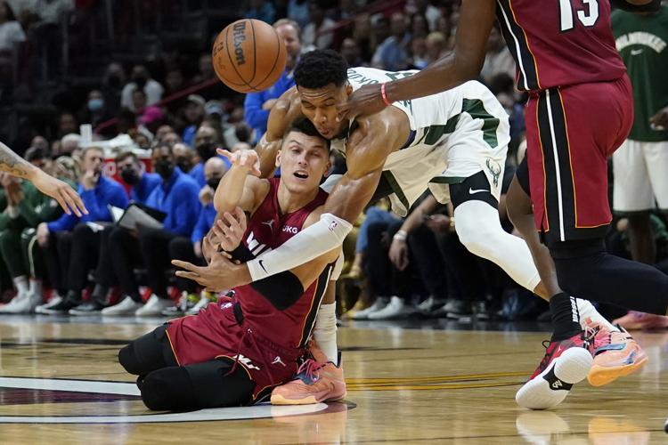 Tyler Herro passes, Giannis defends, AP generic file photo