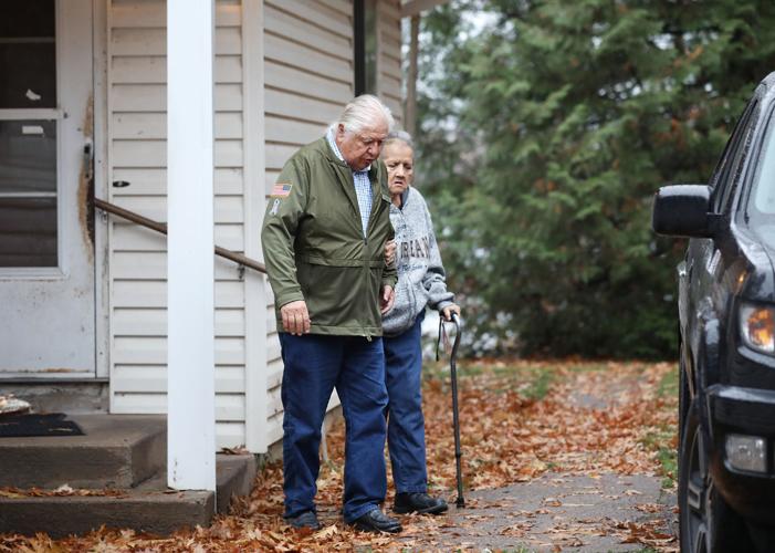 Bill and Jacqui outside of their home