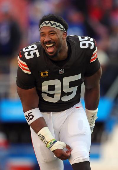 Browns defensive end Myles Garrett is all smiles as he jogs back inside before a game, Dec. 21, 2025, in Cleveland.