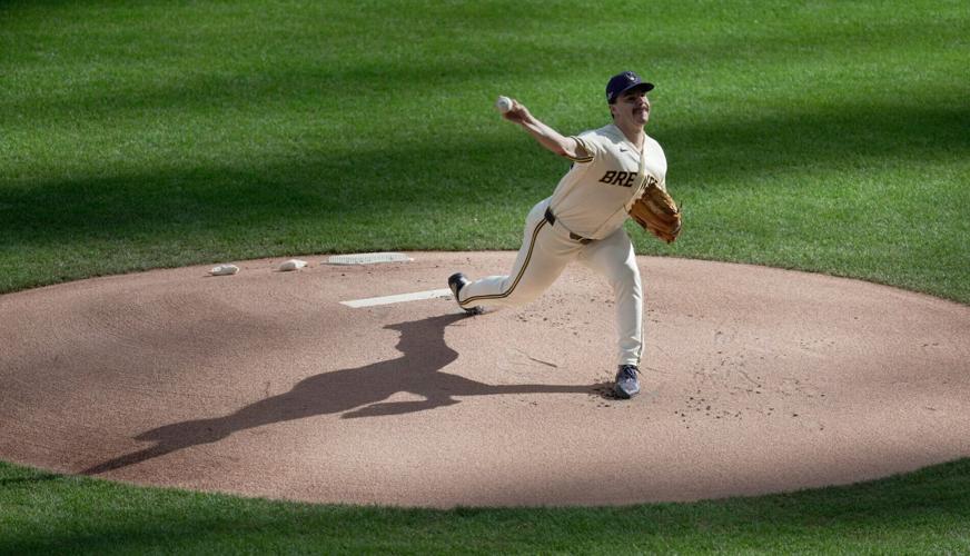 Milwaukee Brewers pitcher Logan Henderson (43) throws during the first inning of their National League Division Series game