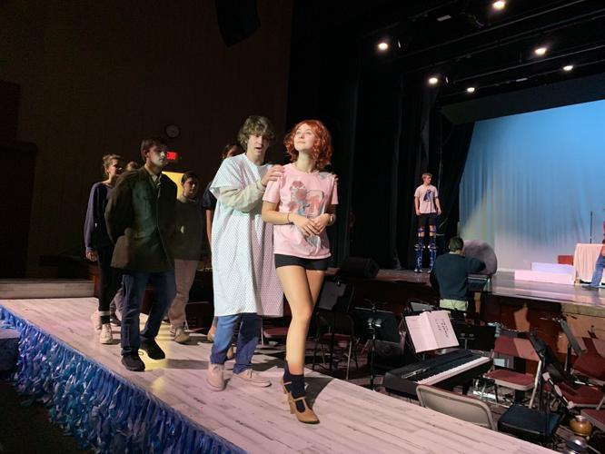 Cast members from "Big Fish: The Musical" rehearse a scene