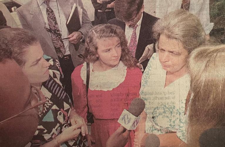 Sabrina and Janice talk to reporters