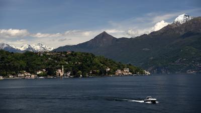 Lake Como is lined with luxurious villas, crowned by snow-capped mountains, and busy with fleets of little ferries darting from one cute town to another.