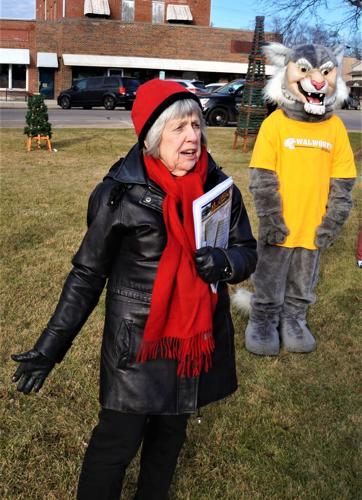 Walworth Village Board President Louise Czaja provides a welcome address at the inaugural "Lighting the Square" ceremony