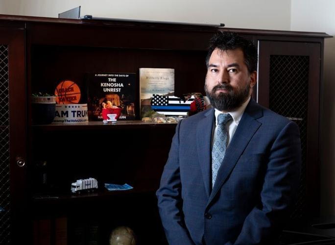 Kenosha County District Attorney Xavier Solis stands for a portrait in his office in the Molinaro Building on Tuesday, Dec. 23, 2025 in Kenosha, Wisconsin.