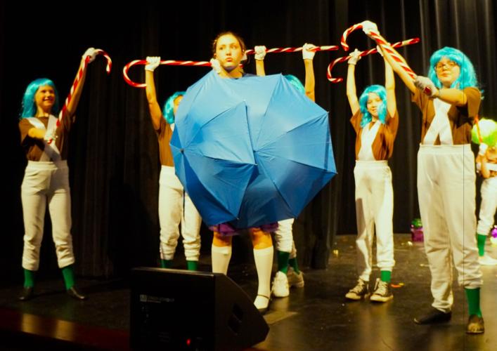 Violet Beauregard lives up to her name as she transforms into a purplish-blue blueberry