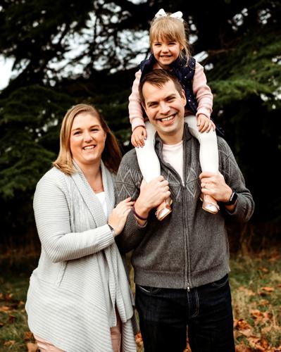 Monica Pfeifer, left, and her husband Luke Pfeifer, pictured with their daughter Bayleigh, plan to purchase the Maxwell Mansion