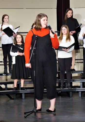 Williams Bay Middle School-High School choir teacher welcomes 2022 Winter Concert attendees